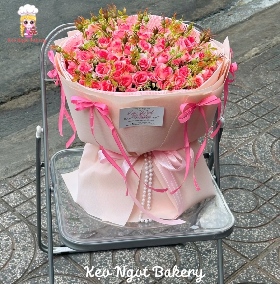 Bó hoa tươi tone hồng kèm nơ tặng dịp ý nghĩa 