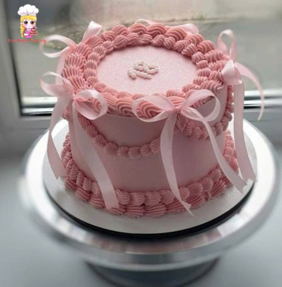 Bánh kem tone hồng kèm nơ lụa