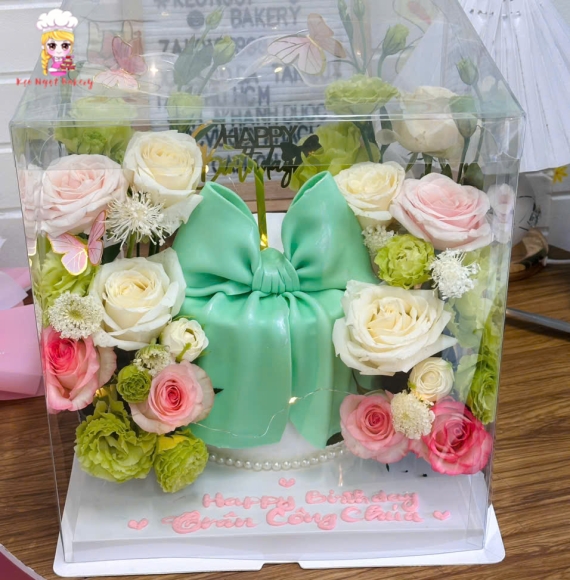 Bánh kem nơ xinh hoa tươi tone xanh pastel