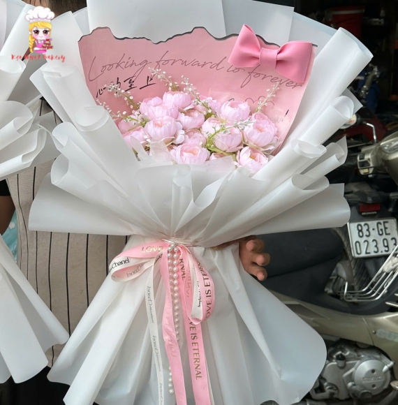 Mẫu bó hoa sáp tone hồng giao tại quận 1