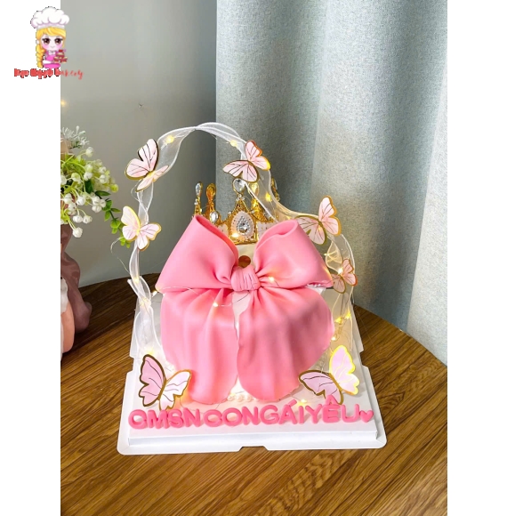 Bánh kem tươi nơ fondant tone hồng tặng con gái