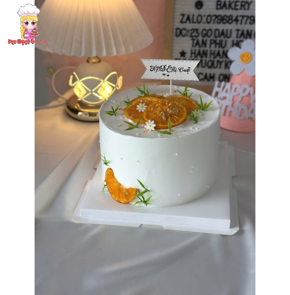 Bánh kem trang trí cam vàng