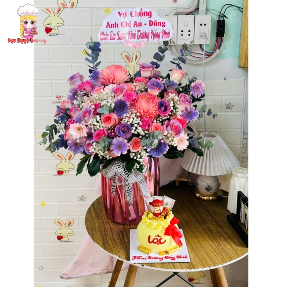 Giỏ hoa chúc mừng khai trương và bánh kem chúc mừng khai trương