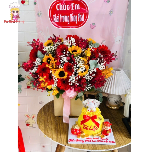 Giỏ hoa chúc mừng hoa hướng dương kết hợp đồng tiền kèm bánh khai trương
