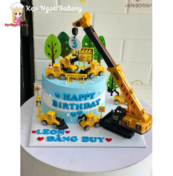 Bánh kem tặng bé trai yêu thích xe múc xe cẩu